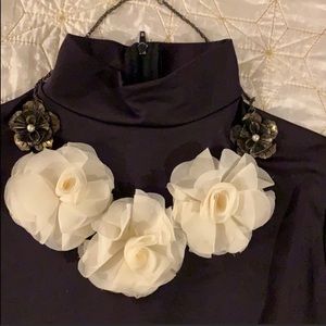 Sheer material roses of cream color